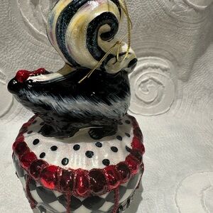 MacKenzie-Childs Black and White Skunk Ornament with Red Accents